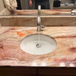 Replace two master bath lav faucets with owner provided ones in Denver