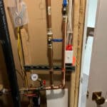 Repipe water softener and move thermal expansion tank on heat exchanger in Boulder