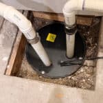Lid to sump pump is rotted out. in Denver