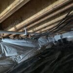 Proposal to run discharge from sump pump to the downspout drain on four units in the same building. in Denver