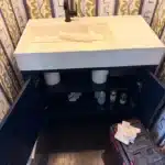 Pull WC and lav and set in garage in Superior