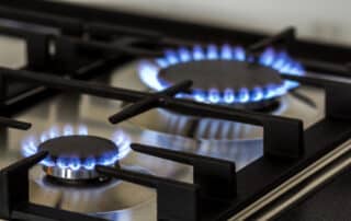 Lit gas stove burners