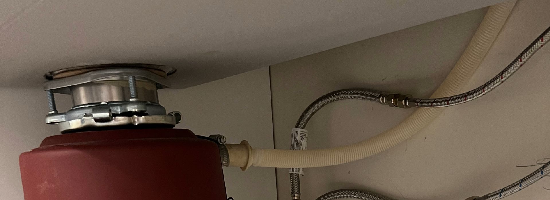 Under-sink plumbing pipes and connections