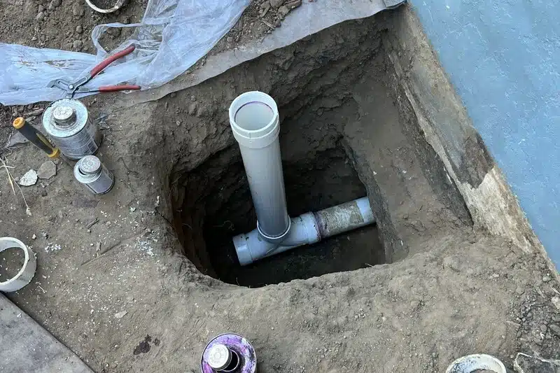 plumbing-services-arvada-img-02 Installed drainpipes in trench excavation